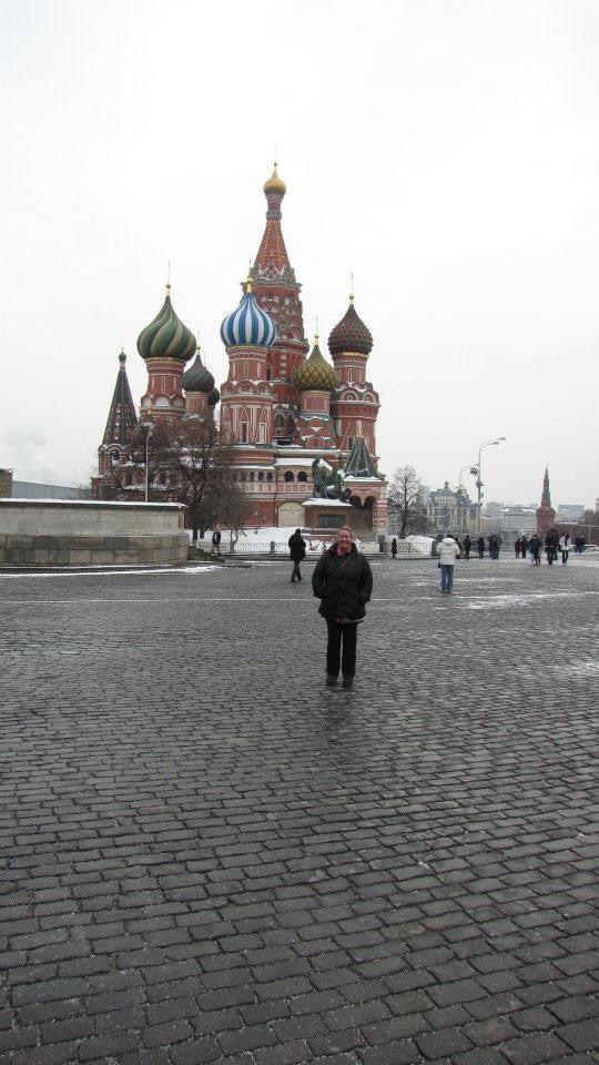 Stacey Sandlin Benas Veikalas Mortgage Broker Slam Dunk Mortgage Team Viera Melbourne Florida, family travels in Saint Basil’s Cathedral in Moscow with people walking in front.” iconic Saint Basil’s Cathedral, situated at Moscow’s Red Square. Its colorful onion domes and red brick towers make it instantly recognizable.